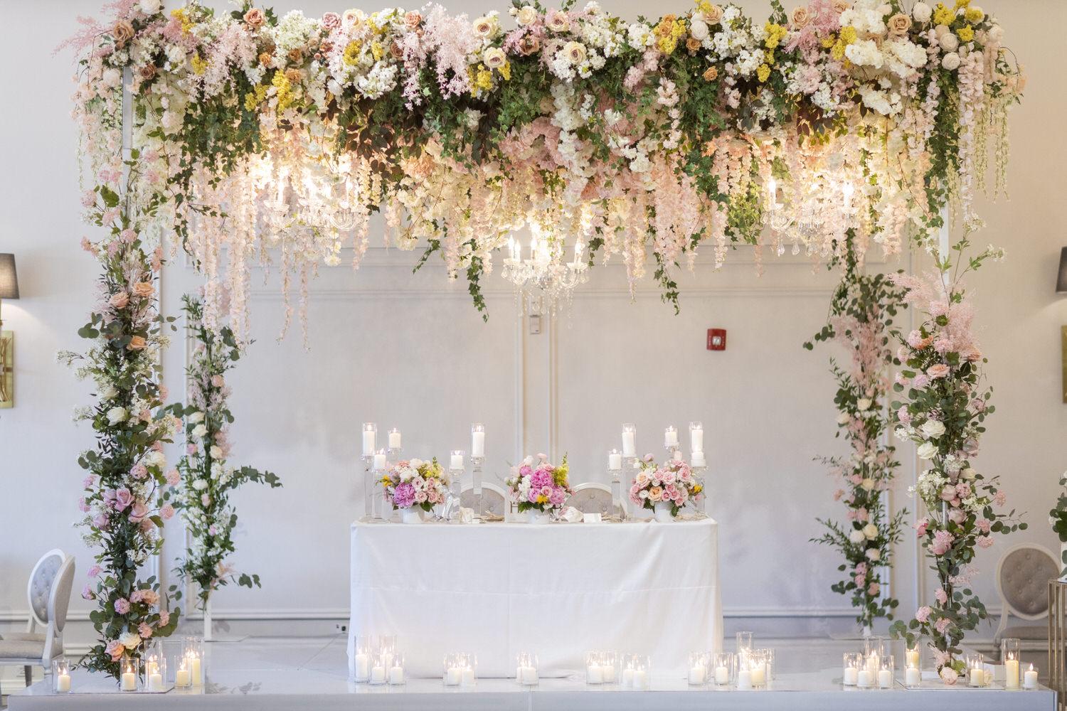 Luxury wedding ceremony floral arch with white roses