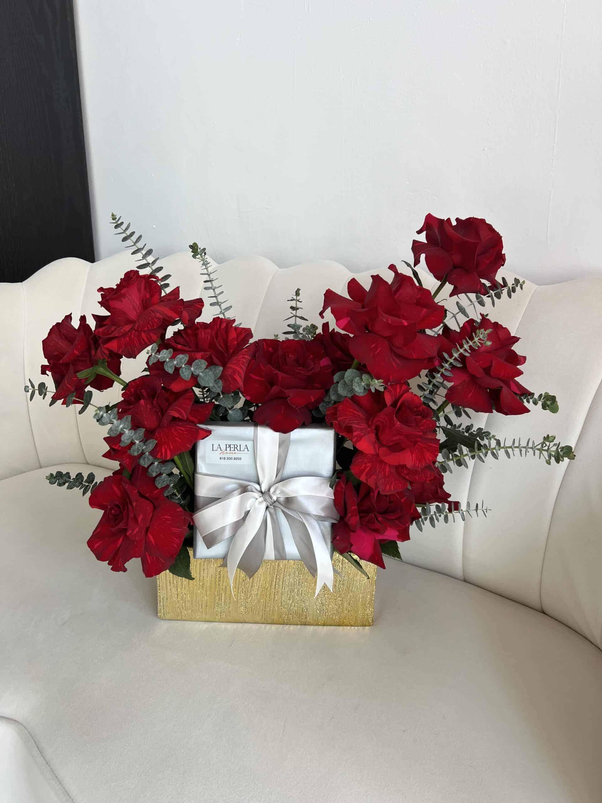 Deep red velvet roses arranged in a luxury signature bouquet