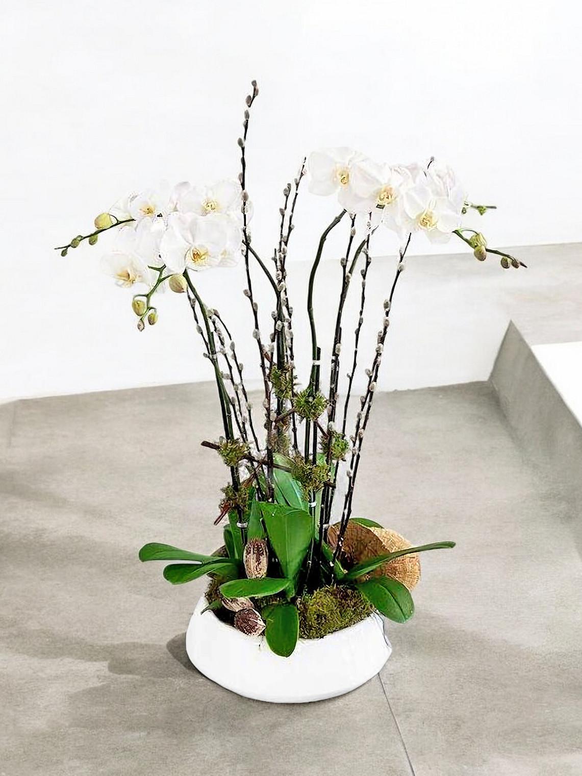 White flowers arranged in a ceramic vase